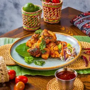 Fried chicken thigh with three-flavor sauce
