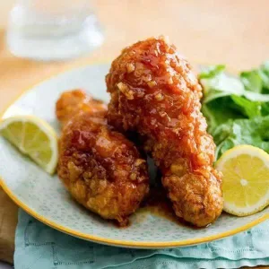 Fried rice with fried chicken thighs in fish sauce