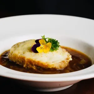 French onion soup with melted cheese crouton
