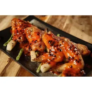 Fried chicken wings with passion fru