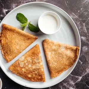 Blini with sour cream
