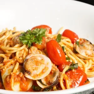 Tagliolini alle vongole with clam, white wine, cherry tomato