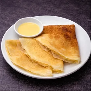 Blini with condensed milk
