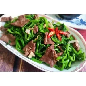 Beef stir-fried with morning glory