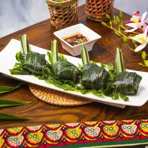 Chicken wrapped in pandan leaves