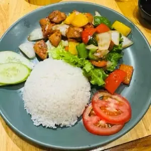 Shaking chicken with steamed rice