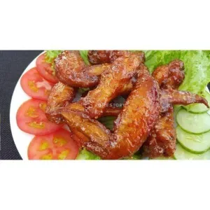 Fried chicken wings with fish sauce and rice
